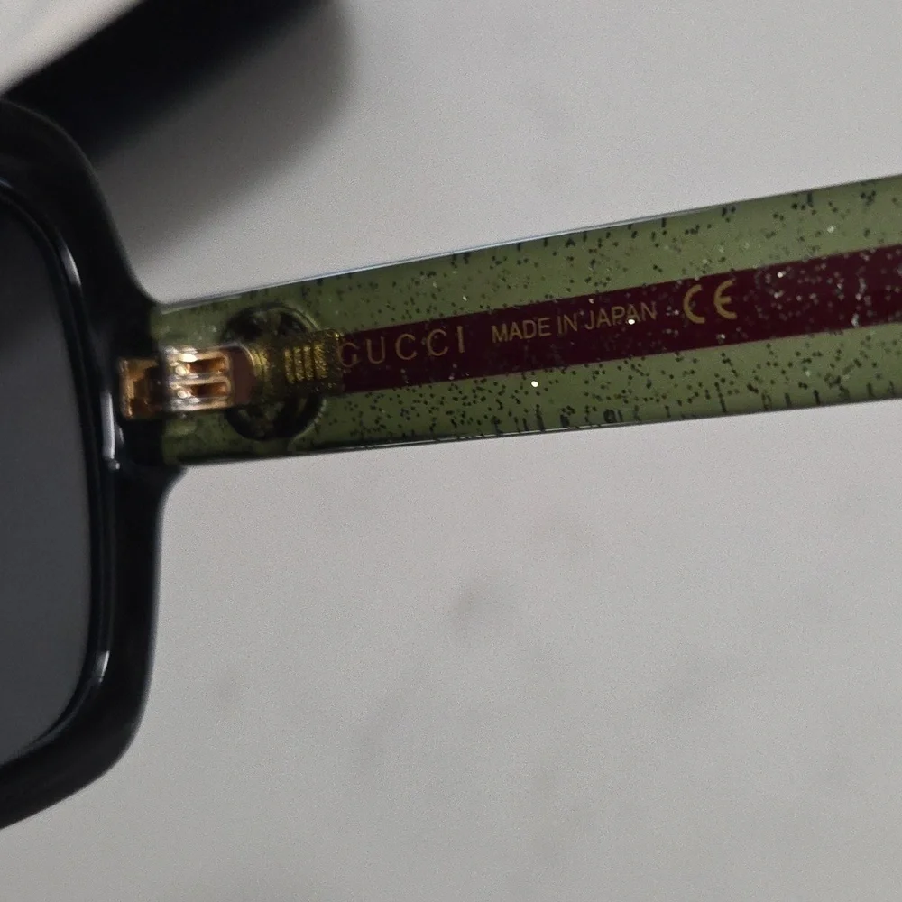 Gucci Women's Sunglasses with Black Frame and Red & Green Accents With Gold Logo